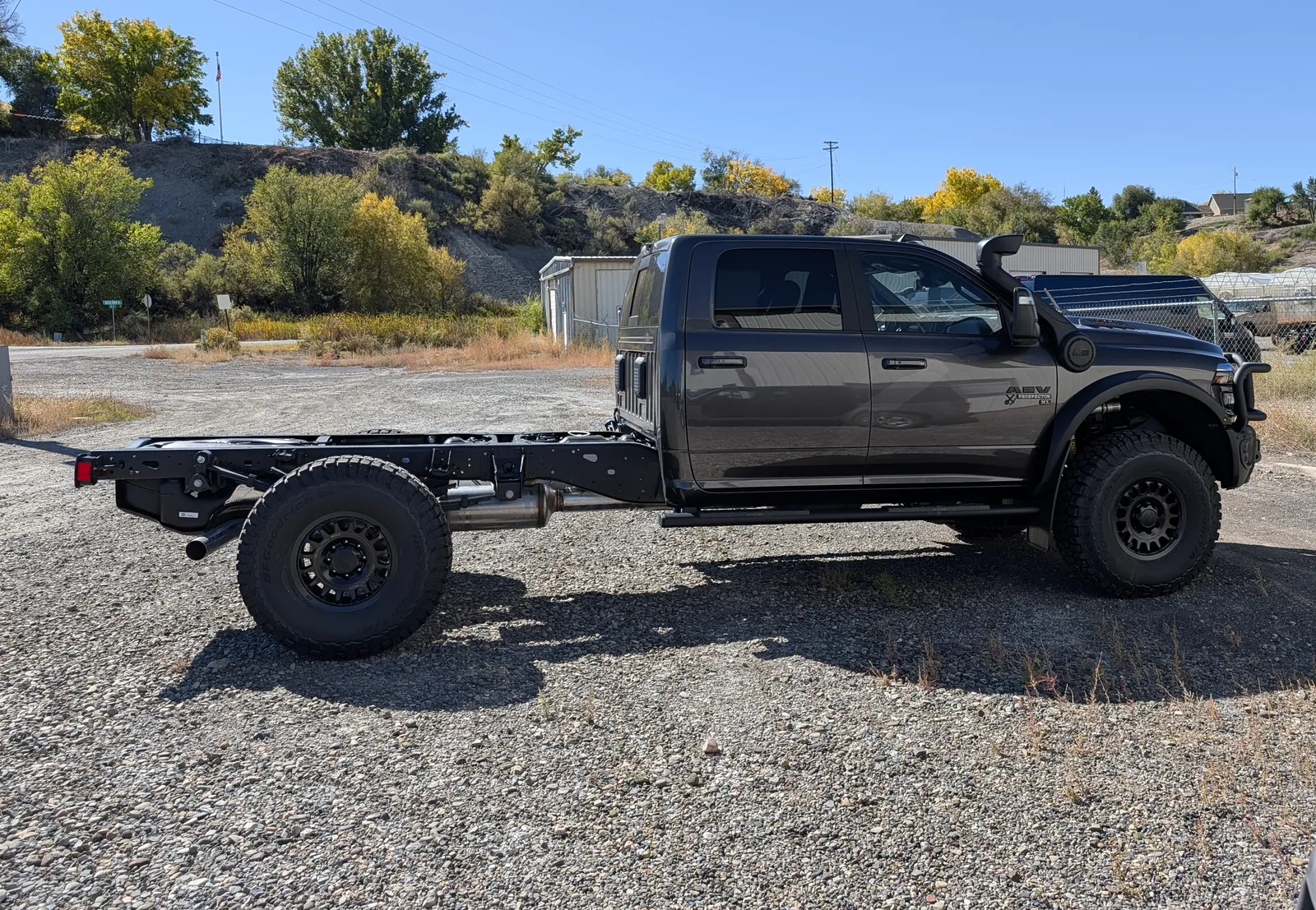Driver-side profile of the cab chassis showing the 60-inch cab-to-axle frame and single rear wheels